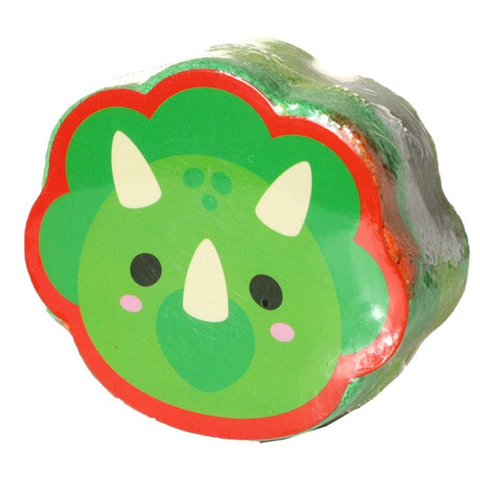 Single dinosaur compressed travel towel showing compact disc shape with triceratops illustration