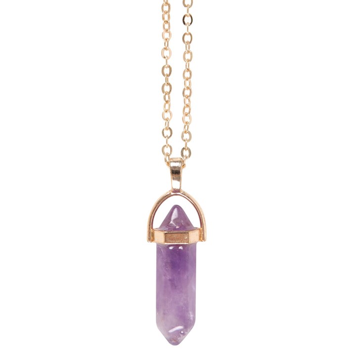close up view of amethyst crystal pendant on gold tone chain