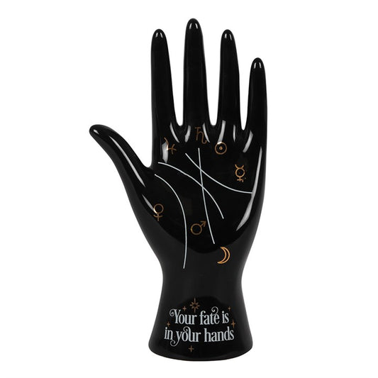 ceramic palmistry hand ornament shown from an angled view highlighting the sculpted hand shape and engraved symbols