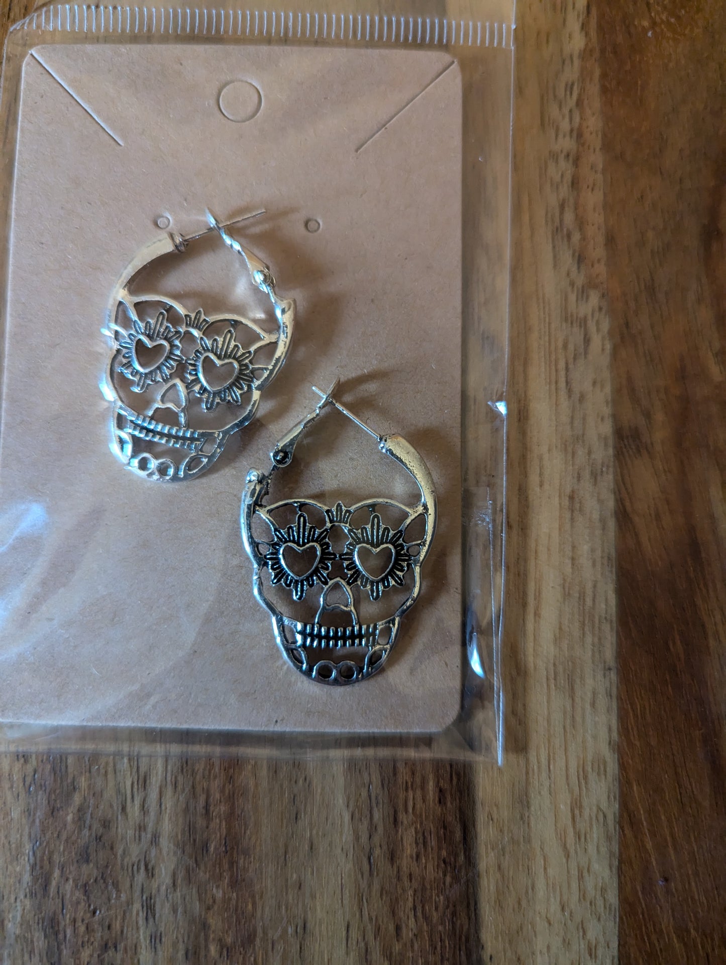 Silver Coloured Skull Earrings