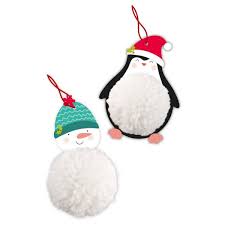 completed christmas pompom crafts, snowman and penguin pompom decorations, festive and fun holiday DIY project for children
