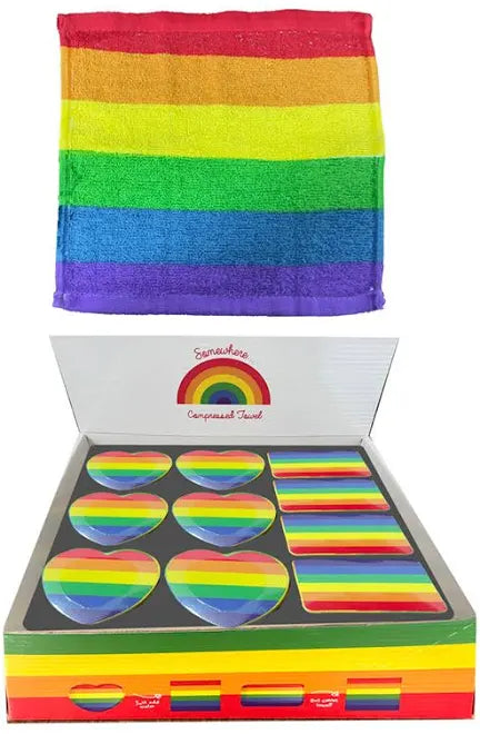 retail pack showing rainbow stripes compressed towels in heart, rectangle, and mixed shapes, ready for gifting