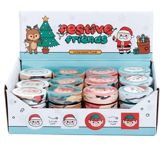 christmas festive friends compressed travel towel, displayed in retail packaging, ideal for gifting or as a travel accessory with festive character