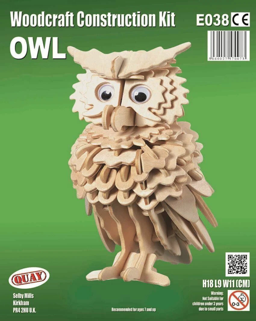 owl woodcraft construction kit flat packed in packaging, pre cut plywood pieces with numbered assembly system for children’s crafting