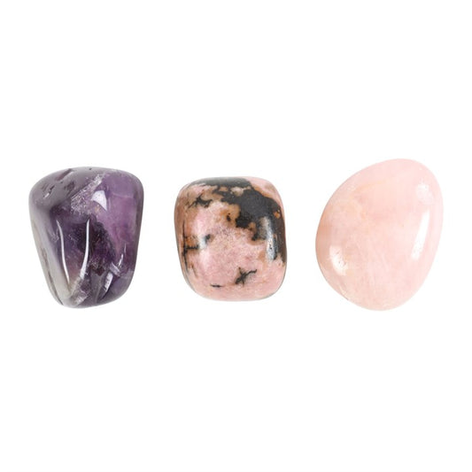trio of healing crystals arranged together for emotional balance and wellbeing
