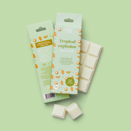 wax bar tropical explosion with mango, melon, coconut, pear, and strawberry creating a refreshing scent