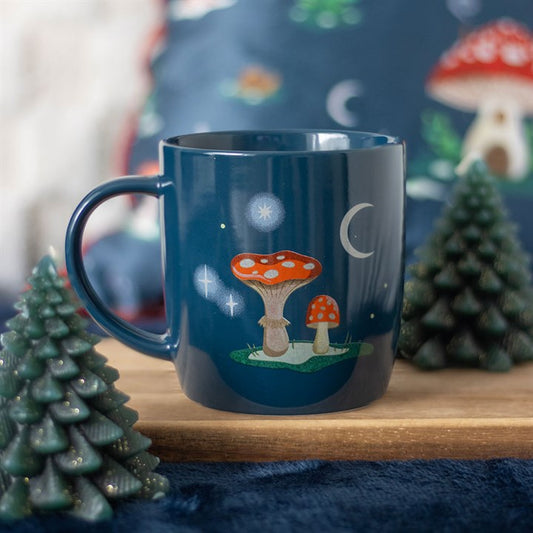 winter forest mushroom house ceramic mug styled in cosy home setting