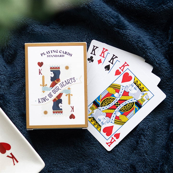 king of our hearts playing cards displayed in home setting with cards revealed
