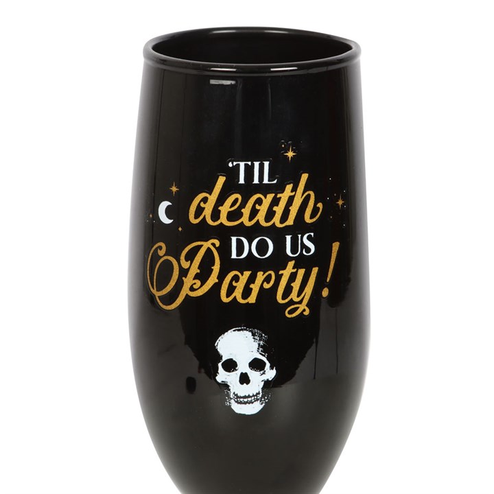 close up of til death do us party wording on champagne flute