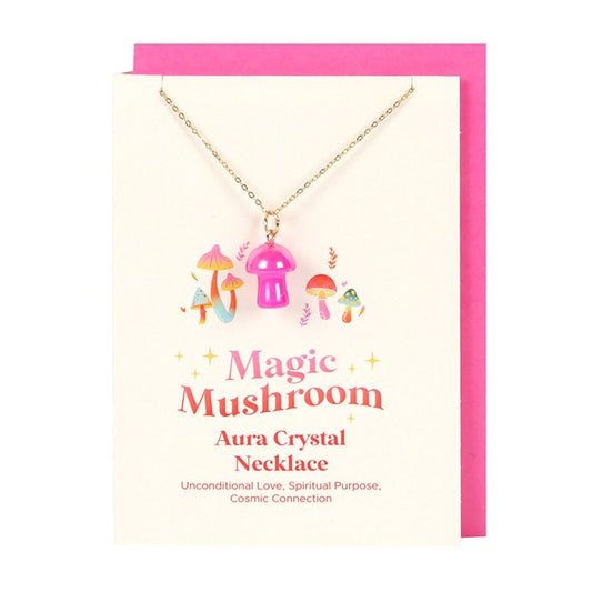 pink mushroom aura necklace displayed on greeting card with envelope ready for gifting