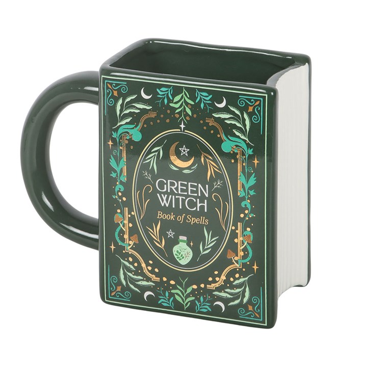 decorative green witch ceramic mug shown from angled perspective with detailed spellbook styling