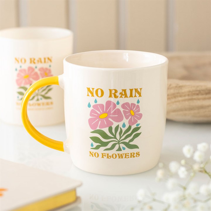 no rain no flowers ceramic mug styled in home setting with uplifting message
