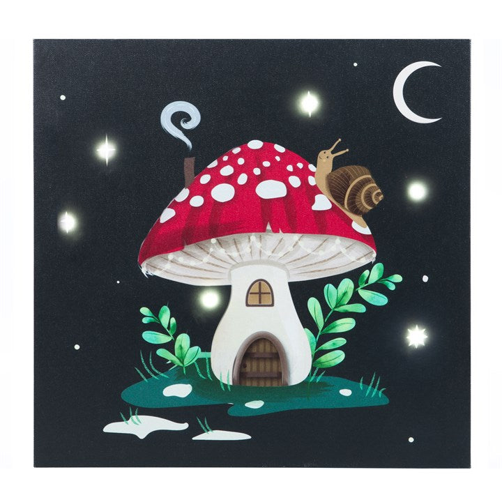 illuminated mushroom house canvas wall art displaying warm ambient glow