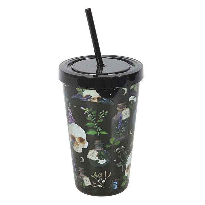 alternative skull themed reusable tumbler with straw shown from side angle