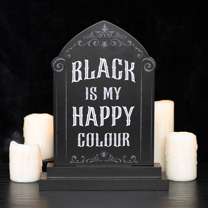 black is my happy colour gothic tombstone sign styled with candles in dark setting