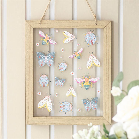 floral bug print glass wall hanging styled in home setting with colourful botanical design