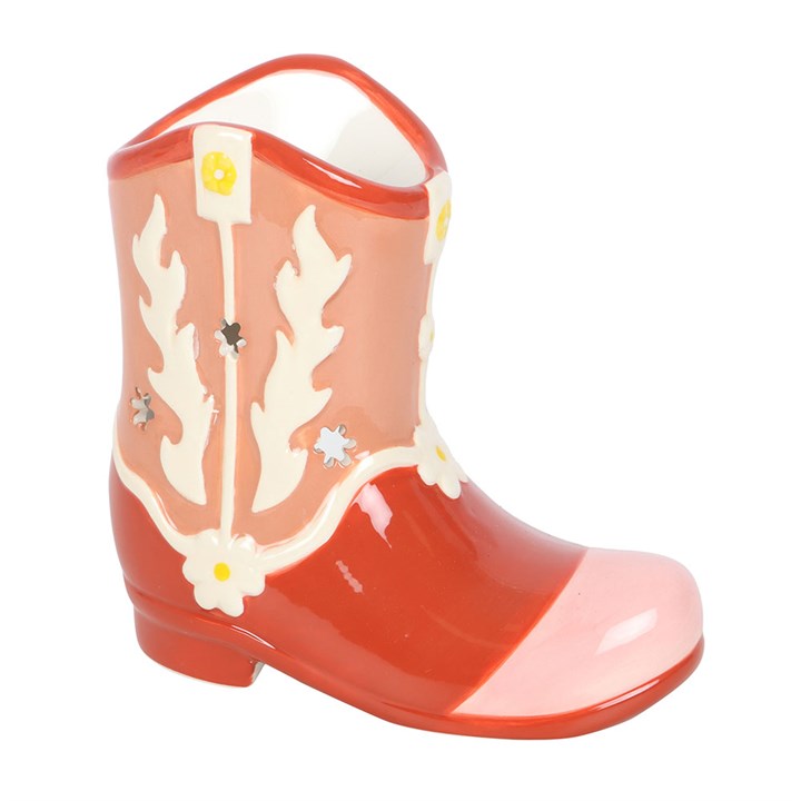 front view of pink cowboy boot ceramic oil burner showing sculpted western design