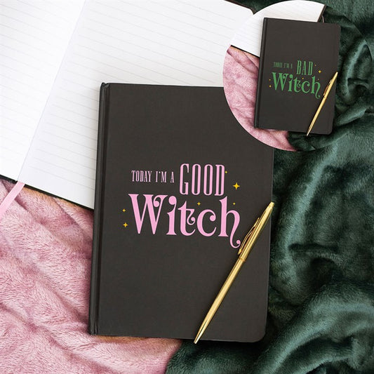 reversible good witch bad witch notebook displayed showing both cover designs together