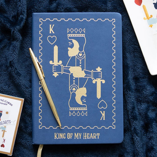 king of my heart playing card notebook styled in home setting with regal design