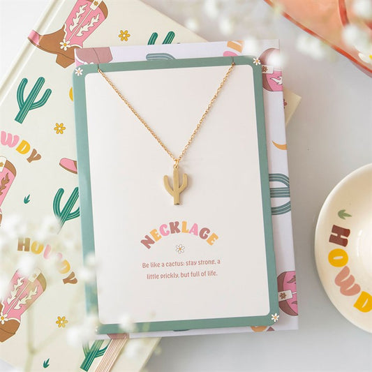 cactus necklace greeting card styled in home setting with motivational western charm