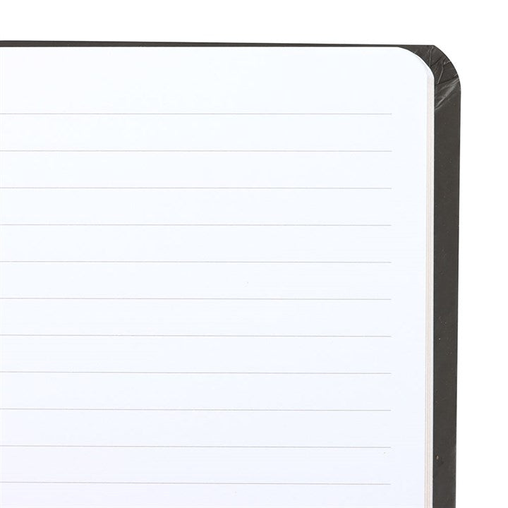 lined notebook pages shown inside witch themed reversible journal