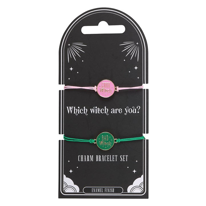 good witch and bad witch charm bracelets arranged together on neutral background