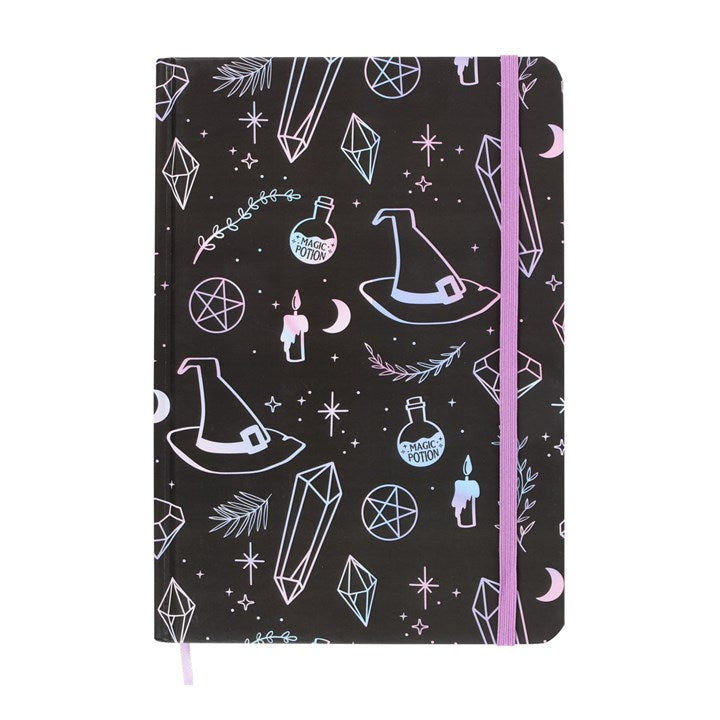 mystical crystal notebook cover displayed with decorative band showing witchy motifs