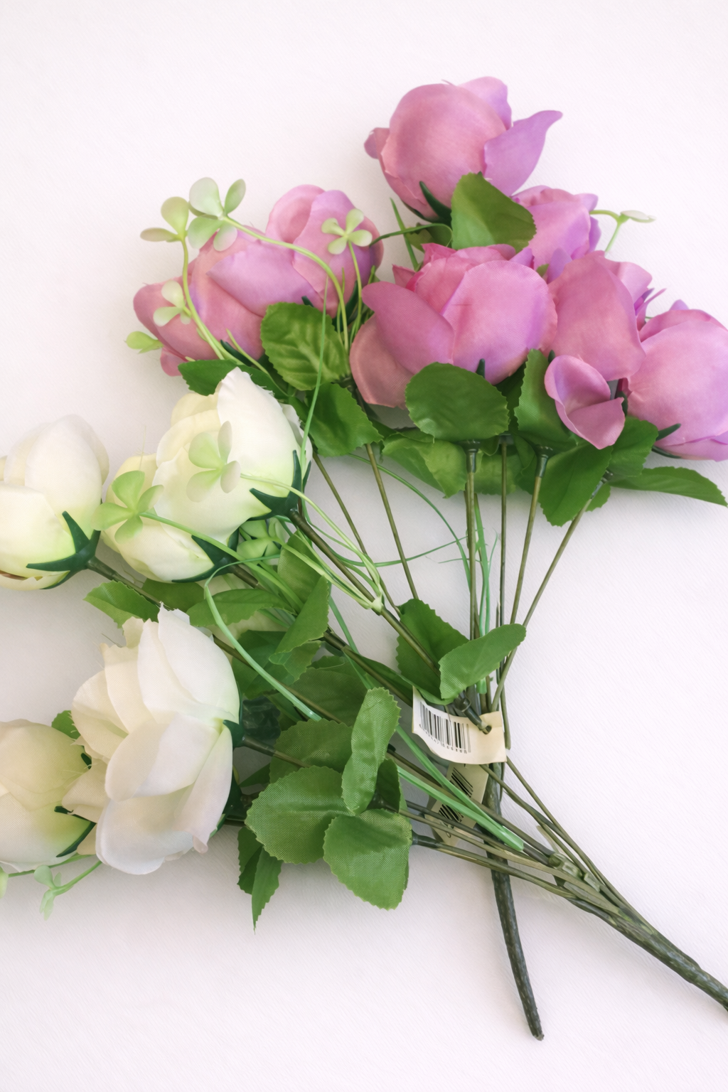 artificial silk rose flower bunch showing two decorative variants with realistic blooms and flexible stems