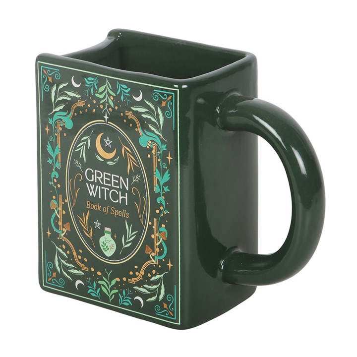 green witch spellbook mug shown from angled view featuring mystical plant inspired design