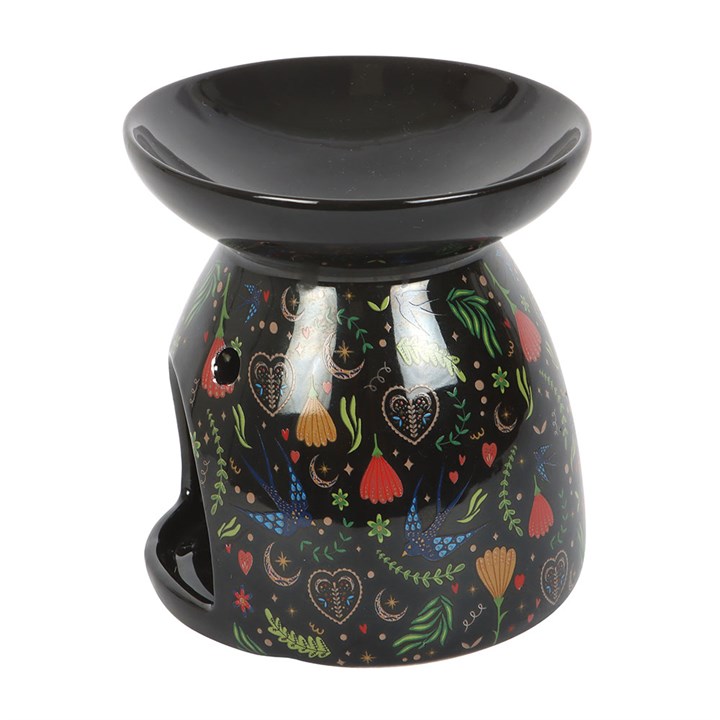 midnight bloom floral wax burner side view highlighting sculpted ceramic shape
