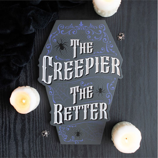the creepier the better gothic wooden sign styled in atmospheric home setting