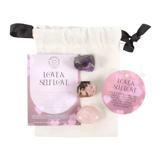 love and self healing crystal set displayed on drawstring gift pouch