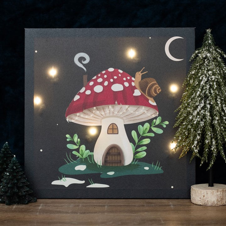 enchanted mushroom led canvas plaque shown front view with fairytale woodland design