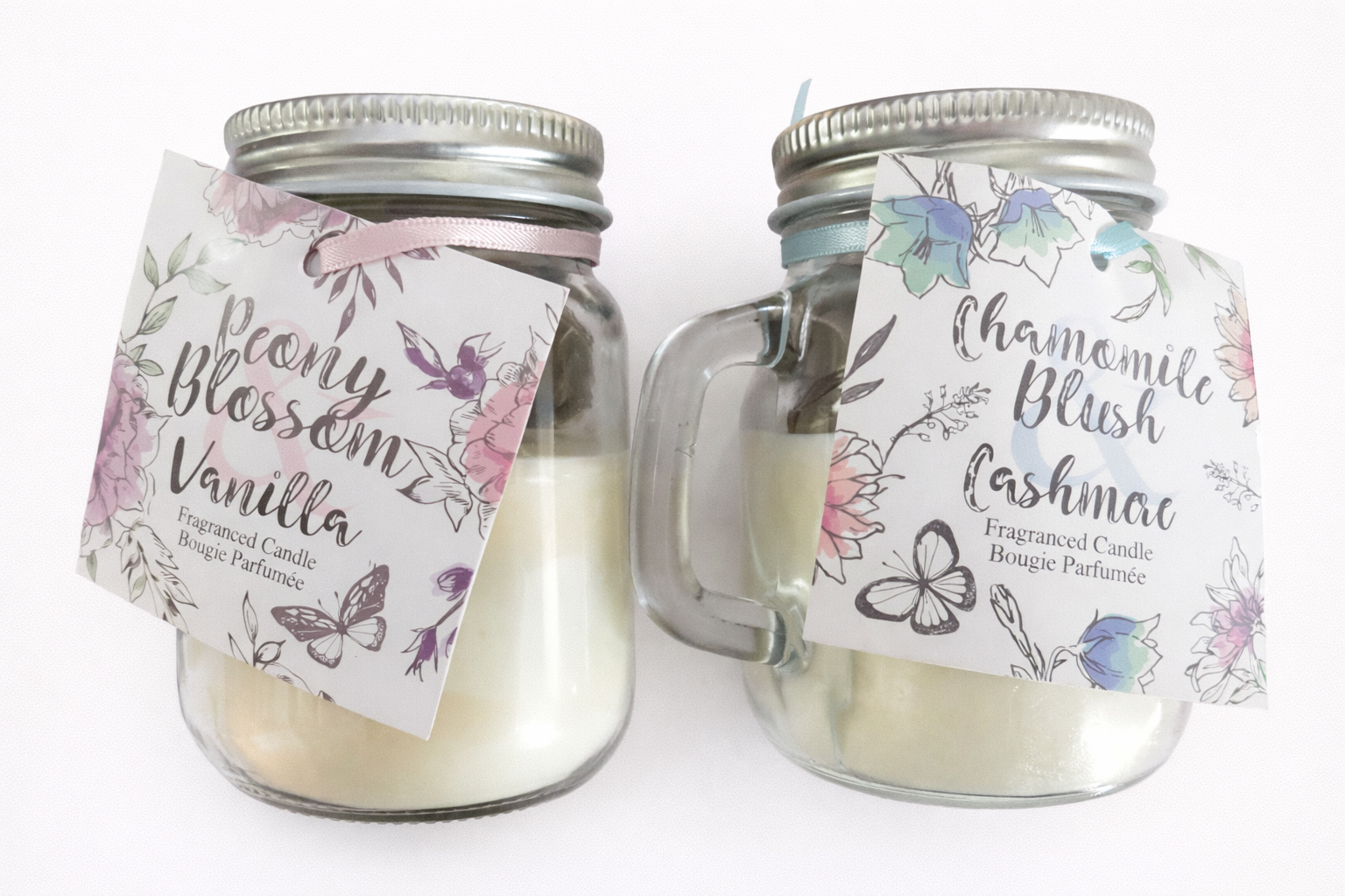 mini scented candle in glass jar with handle showing both fragrance variants