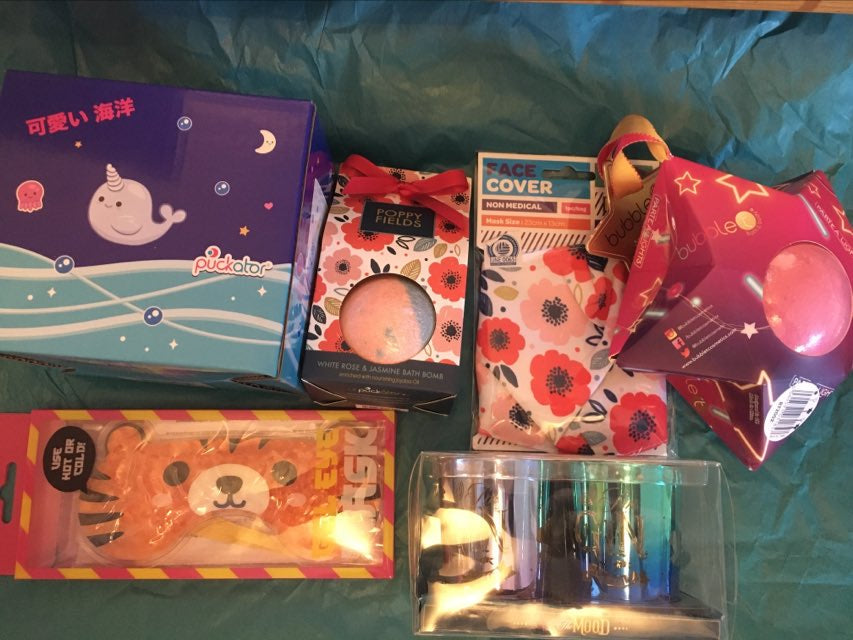 glo bright mystery box example display illustrating variety of items customers may receive