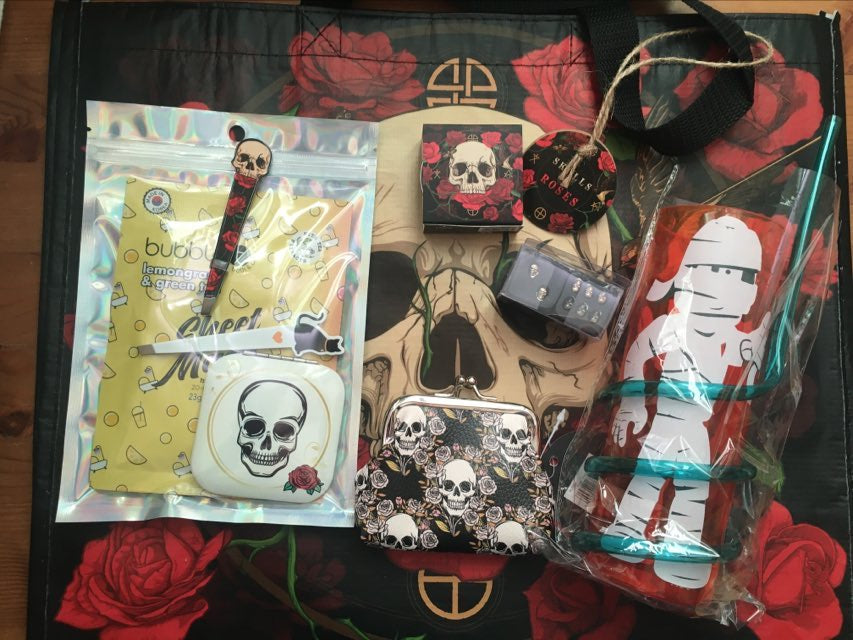 example contents of spooky skulls mystery box with gothic skull-themed items
