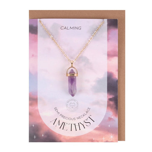 amethyst crystal pendant necklace displayed on greeting card with matching envelope