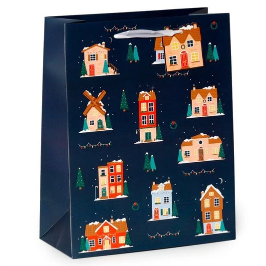 christmas village medium gift bag with illustrated festive scene and attached gift tag