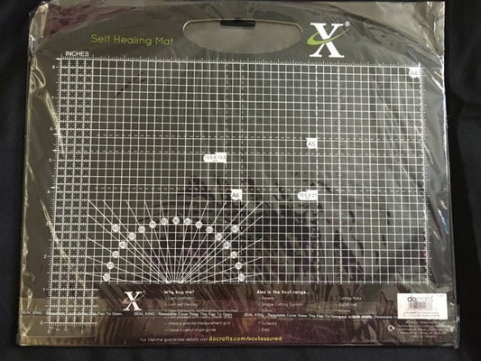 close up view of the a4 self healing cutting mat showing detailed measurement grid paper size guides and angle markings for precise craft cutting